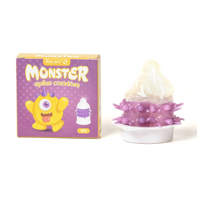 Насадка на член з рядами пухирців і шипів – Recare Yellow Monster Spike Condom, жовтого кольору