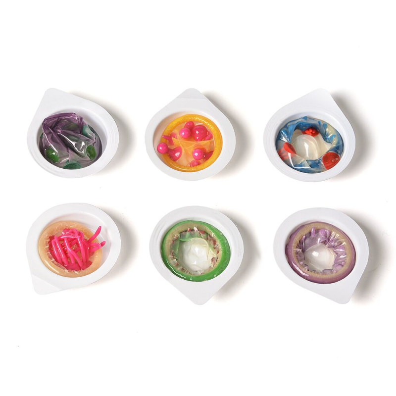 Насадка на член з рядами пухирців і шипів – Recare Yellow Monster Spike Condom, жовтого кольору