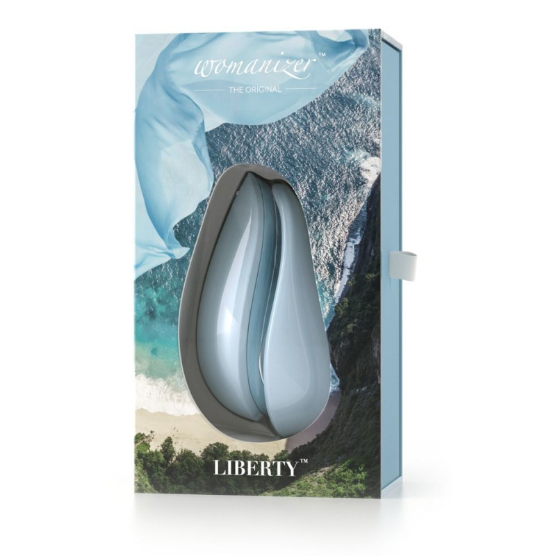 Вакуумний кліторальний стимулятор з магнітною кришкою – Womanizer Liberty Blue – 2 насадки різного розміру